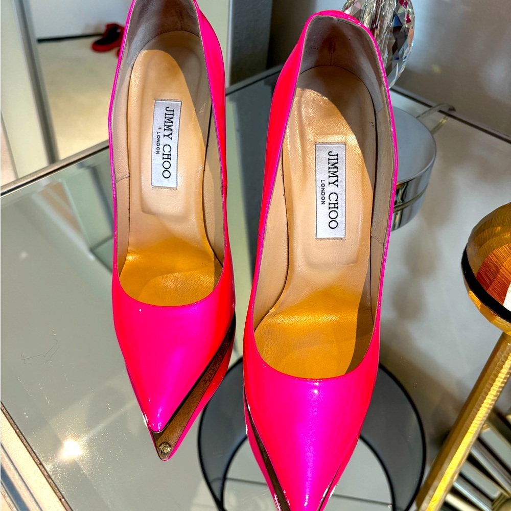Brand new Jimmy Choos, pink Fushia patent leather color. Size 39 fits US 9